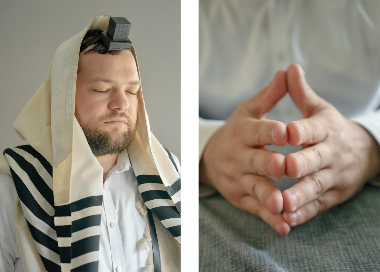 Avraham Shaya Eisenman, 32, wearing tefillin, a small leather box containing religious texts. He says his Clifton community is very diverse and that he has Palestinian American acquaintances, whom he knew during a campaign for a Board of Education seat in 2021. “I am praying for peace,” he says.