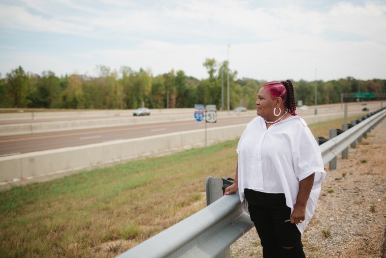 Bettersten Wade near the highway  where her son, Dexter, was fatally run over by police near Jackson, Miss.