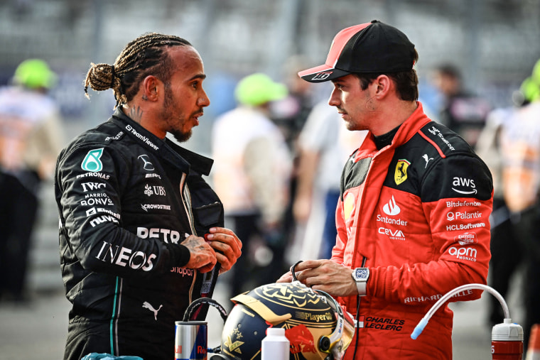Image: Mercedes' Lewis Hamilton speaks with Ferrari's Charles Leclerc