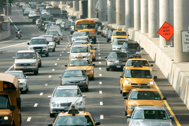 Cars make their way in heavy traffic along the Van Wyck Expressway in New York City in 2005.