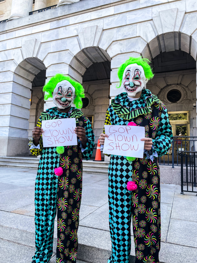 Clowns hired by the Democratic National Committee taunt House Republicans outside the Capitol on Oct. 24, 2023.