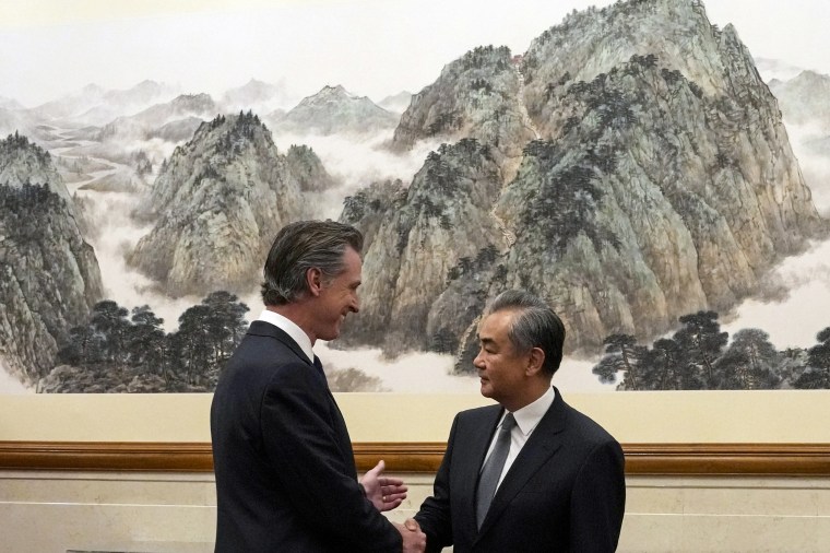 California Gov. Gavin Newsom meets with Chinese Foreign Minister Wang Yi in Beijing.