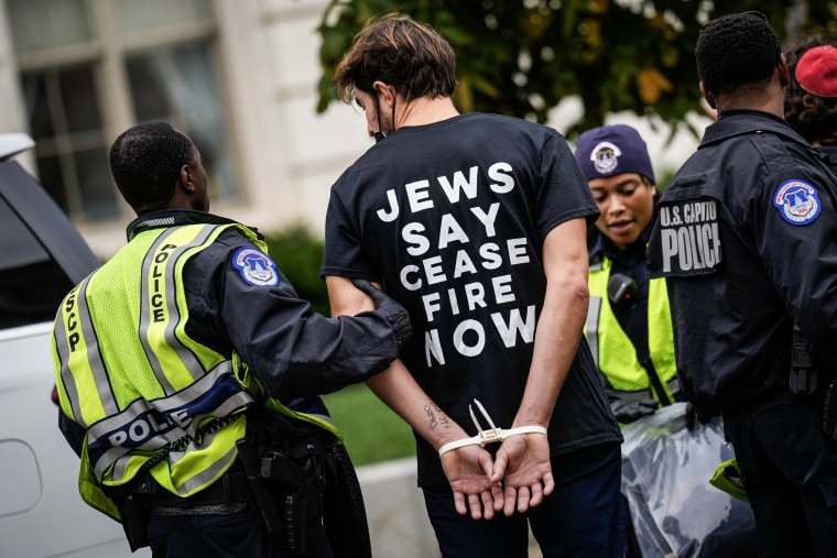 Capitol Police detain a demonstrator at a protest organized by Jewish Voice for Peace and IfNotNow in Washington, D.C.