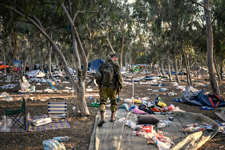 An Israeli soldier patrols near the Supernova music festival attack 