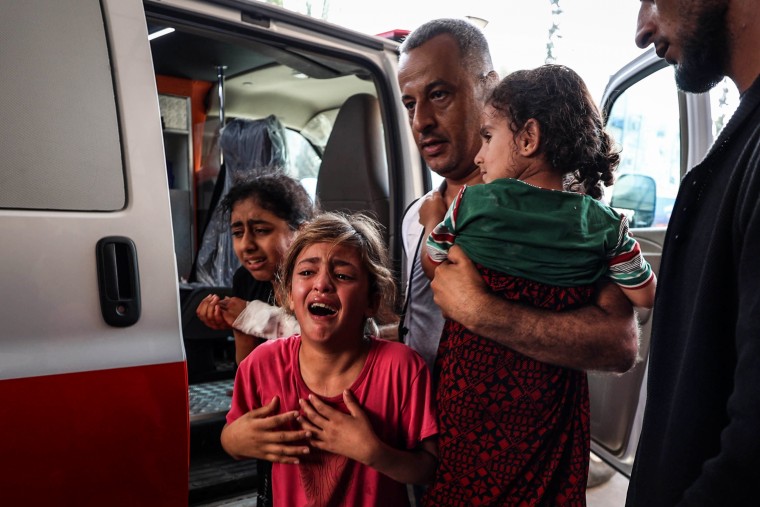 Injured children arrive at Nasser Medical Hospital in Khan Younis, Gaza.