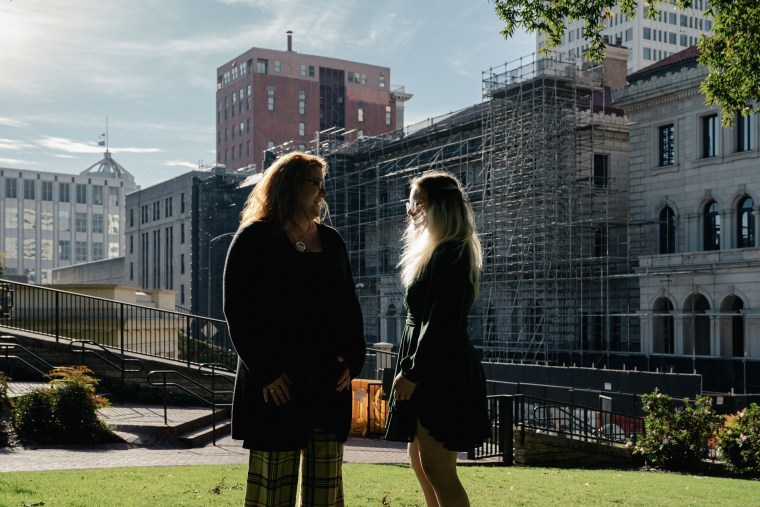 Becky Pepper-Jackson, 13,  jokes with her mother, Heather Jackson, near the U.S. Court of Appeals for the Fourth Circuit after a hearing in Richmond, Va. on Oct. 27, 2023.