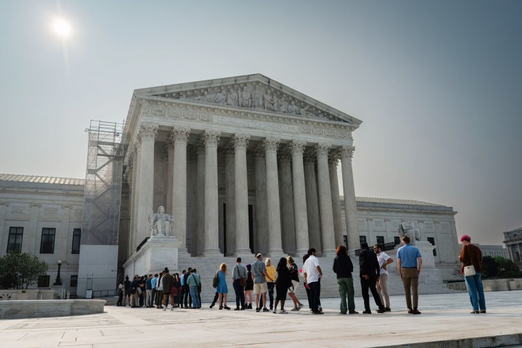 People line up outside of the Supreme Court