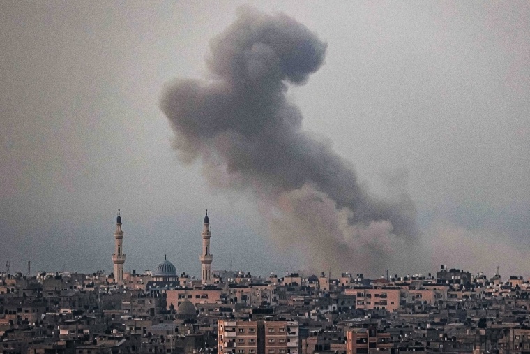 A smoke plume billows after Israeli bombardment in Rafah