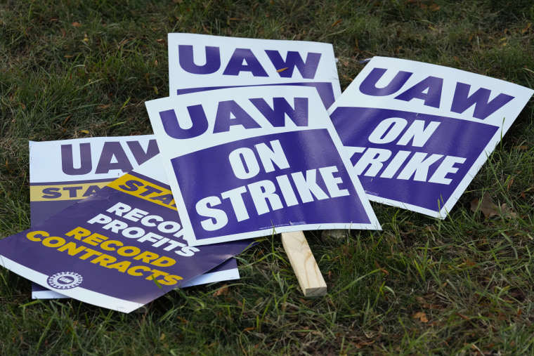 United Auto Workers signs for a strike are shown at the Stellantis Sterling Heights Assembly Plant, in Sterling Heights, Mich., Monday, Oct. 23, 2023.