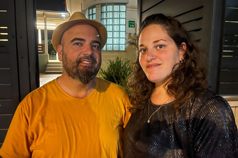 Efrat and Yhonatan Bitton outside their government-provided housing in Afula, northern Israel.