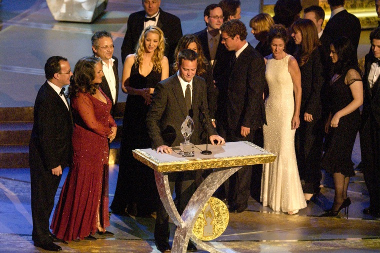Image: The writers and cast of "Friends" accept their award for Favorite Comedy Series at the Annual People's Choice Awards in Pasadena, Calif., in 2003.