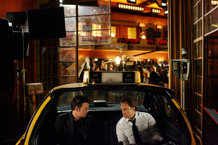 Image: Matthew Perry and Bradley Whitford on the set of "Studio 60 on the Sunset Strip" in 2006.