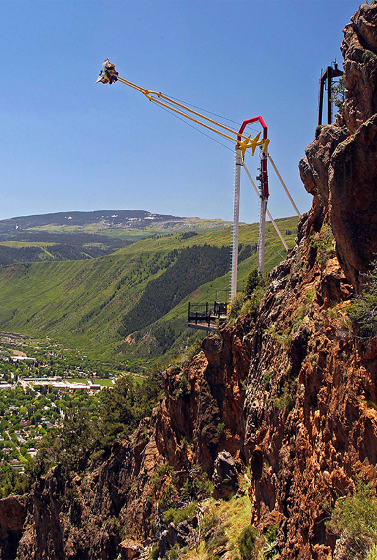 People ride the Giant Canyon Swing at Glenwood Caverns Adventure Park in Glenwood Springs, Colorado, in 2011.