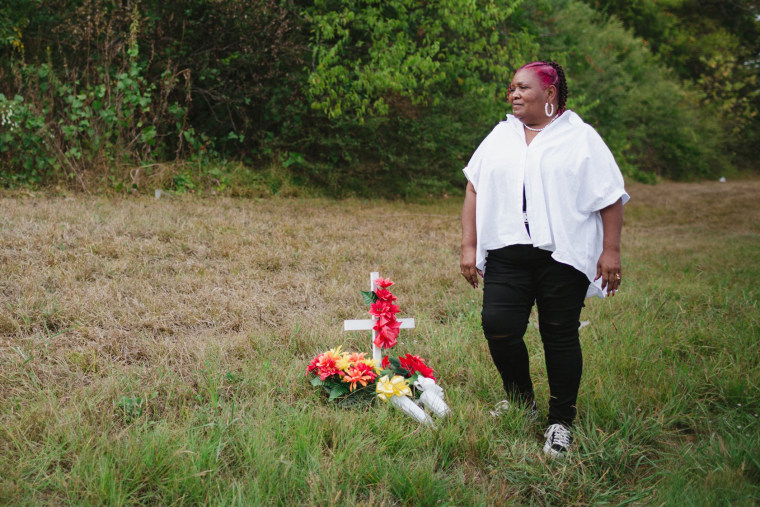 Bettersten Wade visits a memorial to her son, Dexter Wade, beside Interstate 55 where he was struck by a police car.