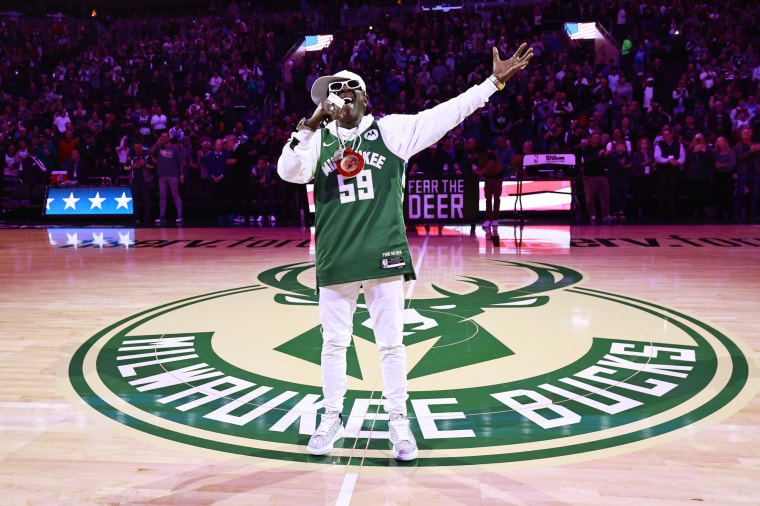 Flavor Flav sings the National Anthem before a Milwaukee Bucks game on Oct. 29, 2023.