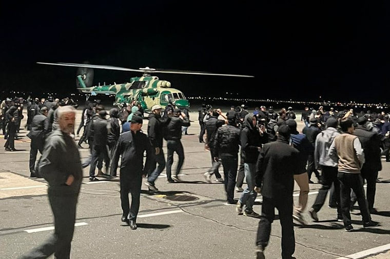 Pro-Palestinian protesters on the tarmac of an airport in Makhachkala, Russia, on Oct. 30, 2023.