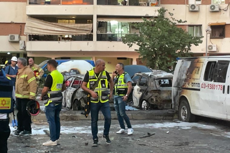 Multiple cars burst into flames in Ashdod in Israel's southern district after a rocket hit a parking lot. 