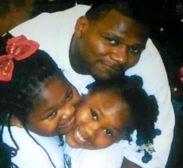 Image: Dexter Wade and his daughters, Johnelle and Joselyn