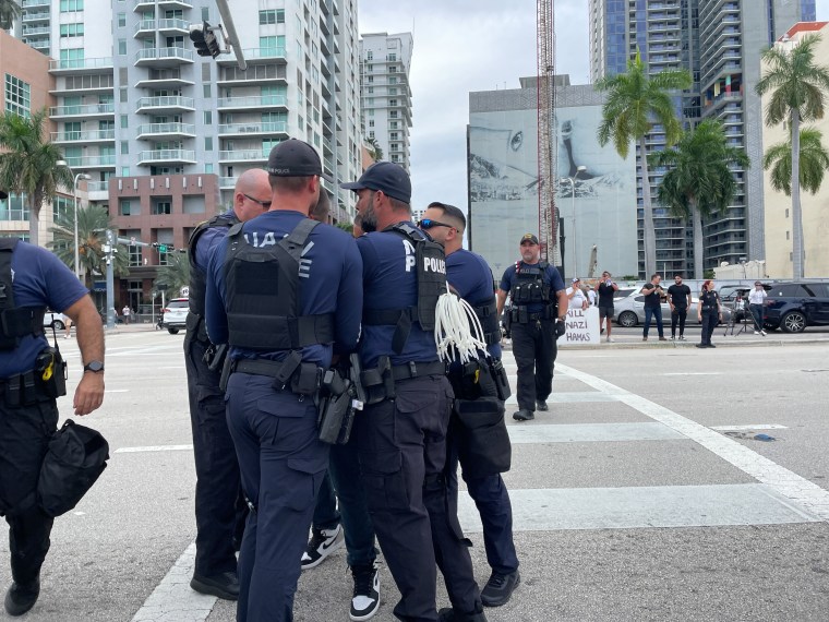 Miami Police arrest a man appearing to cross from the Palestinian side to the Israeli side of the protest.