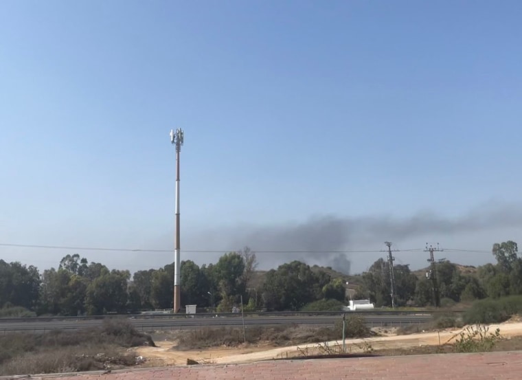 A dark cloud of smoke hangs in the sky from Sderot, Israel.