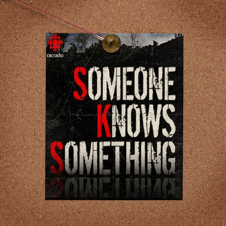 Someone Knows Something logo pinned to cork board