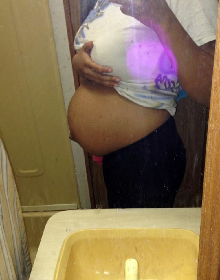 Pregnant Mimi Evans.