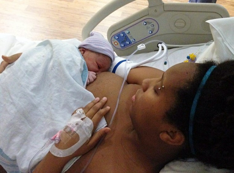 Mimi Evans and hew newborn at the hospital.