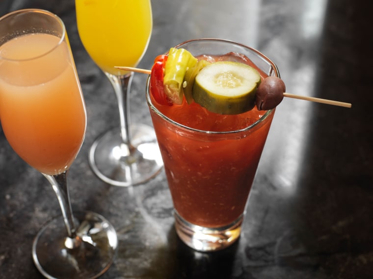 Morning Cocktails on the Bar: Bloody Mary, Mimosa