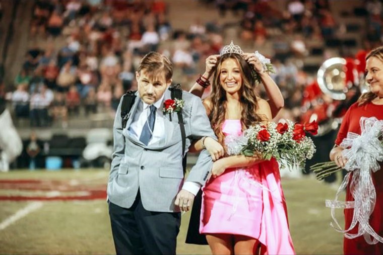 Brett Yancey didn't let his cancer treatments stop him from walking his daughter to be crowned homecoming queen.