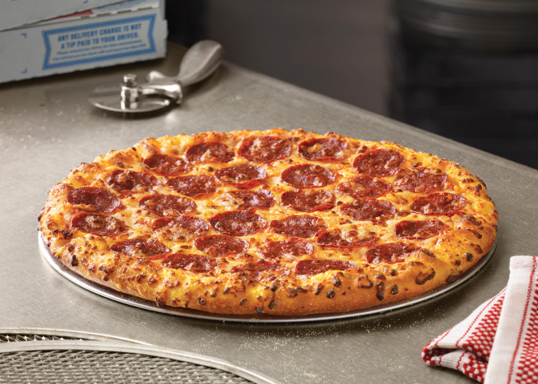 Domino’s is offering customers pizza as financial comfort food.
