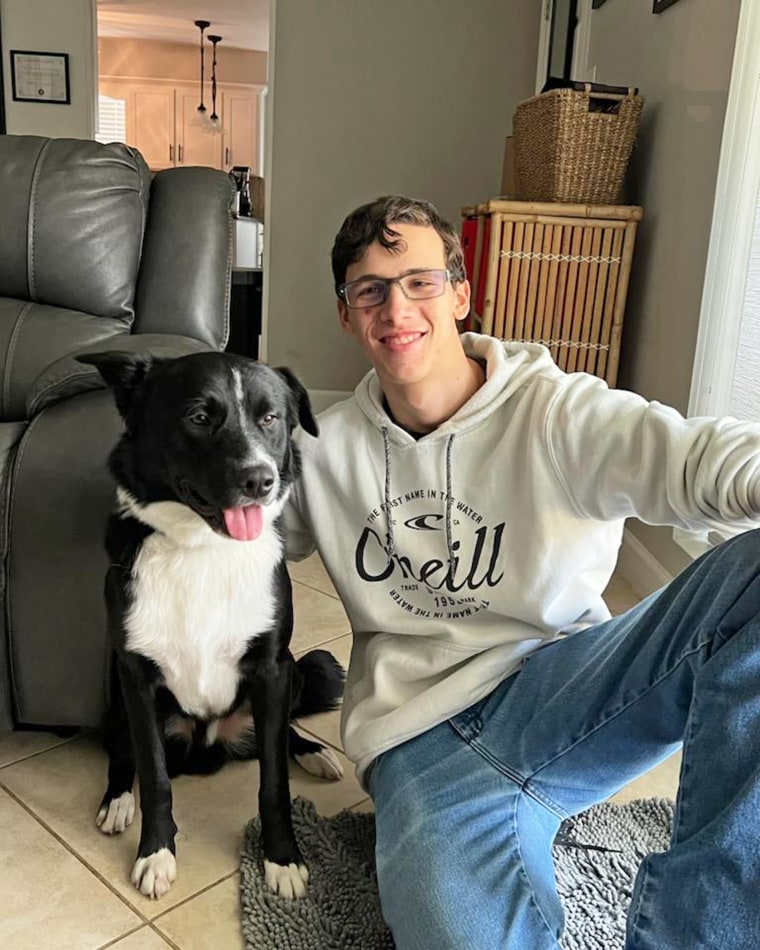 Teen and family dog