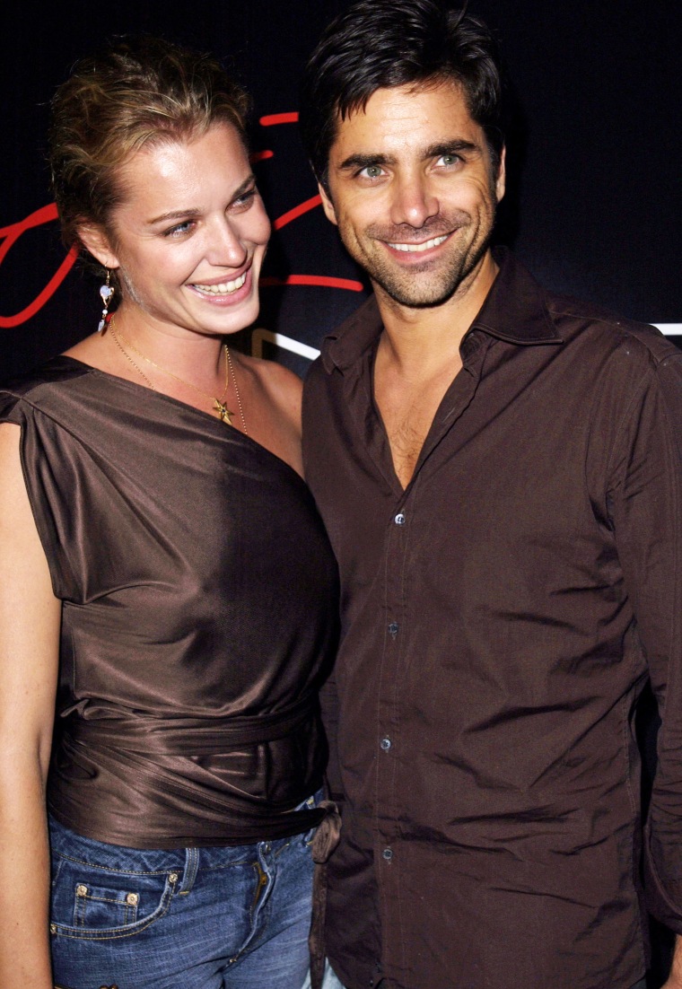 Rebecca Romijn and John Stamos