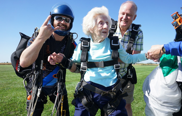 Hoffner celebrates after a smooth landing following her skydive.