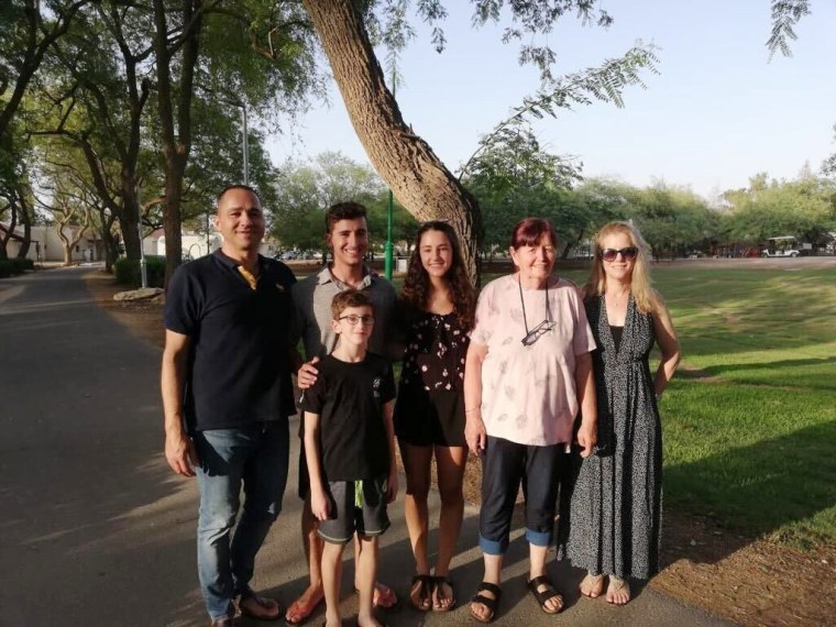 Bracha Levinson, second right, with her family.