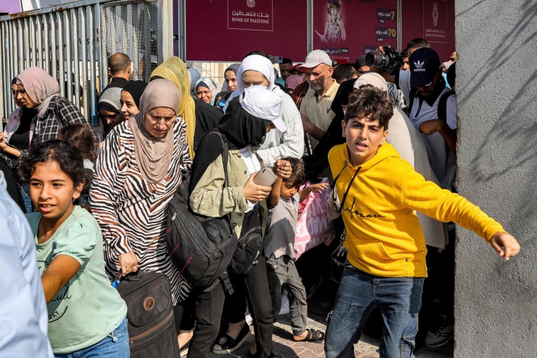 First civilians leave Gaza through Rafah border crossing to Egypt