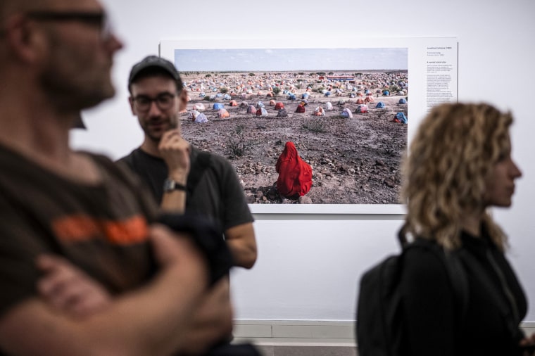 Jonathan Fointaine's "The Nomad's Final Journey" on display at the World Press Photo exhibition at the Hungarian National Museum.
