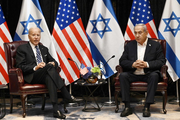 President Joe Biden with Israel's Prime Minister Benjamin Netanyahu as he joins a meeting of the Israeli war cabinet in Tel Aviv