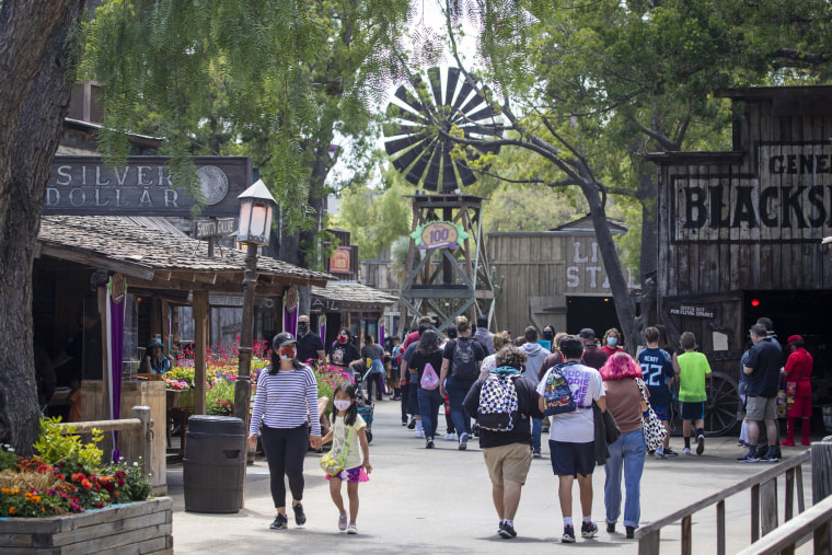 Visitors stroll through the Old West Ghost Town at Knott's Berry Farm on May 29, 2021 in Buena Park, California.