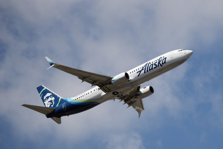 A Boeing 737-990 operated by Alaska Airlines takes off from JFK Airport in the Queens, N.Y.