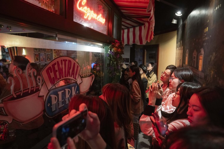 Fans of the hit sit-com "Friends" gather at a Central Perk themed cafe to mourn the death of Matthew Perry in Shanghai