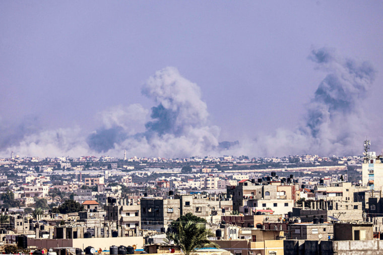 A wide image overlooking the Khan Yunis skyline as smoke rises amid the Israeli offensive in Gaza
