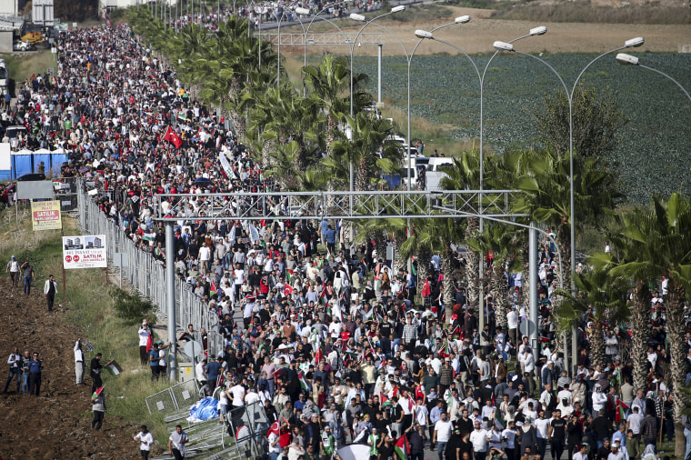 Pro-Palestinian protesters gather outside the Incirlik military air base in Adana, Turkey.