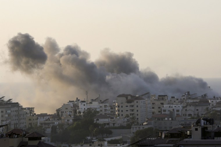 Smoke billows over Gaza City.