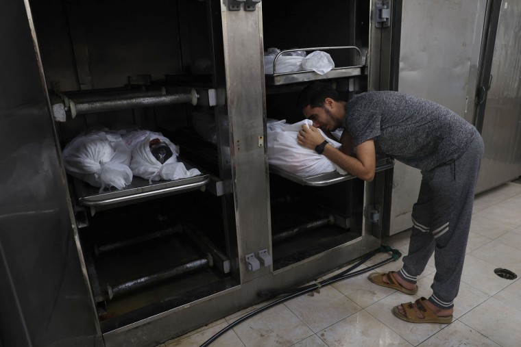 The bodies of members of the same Palestinian family are placed in the morgue of the al-Najar hospital, prior to their funeral in Rafah, in the southern Gaza Strip on Nov. 6, 2023.