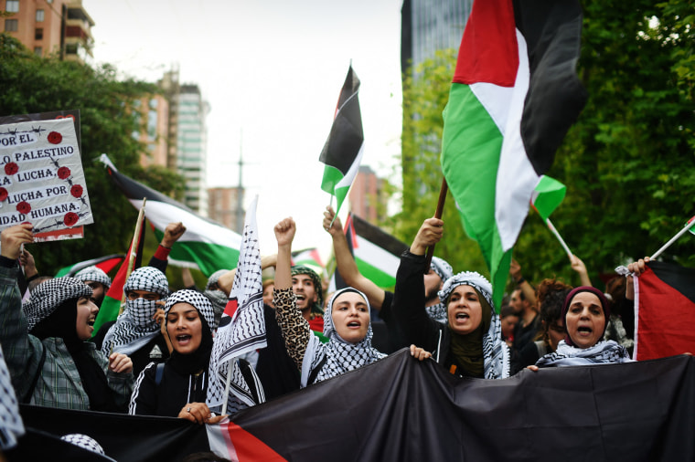 Members of the Palestinian community in Chile protest outside the Israeli Embassy against military operations in Gaza on Oct. 19, 2023, in Santiago.