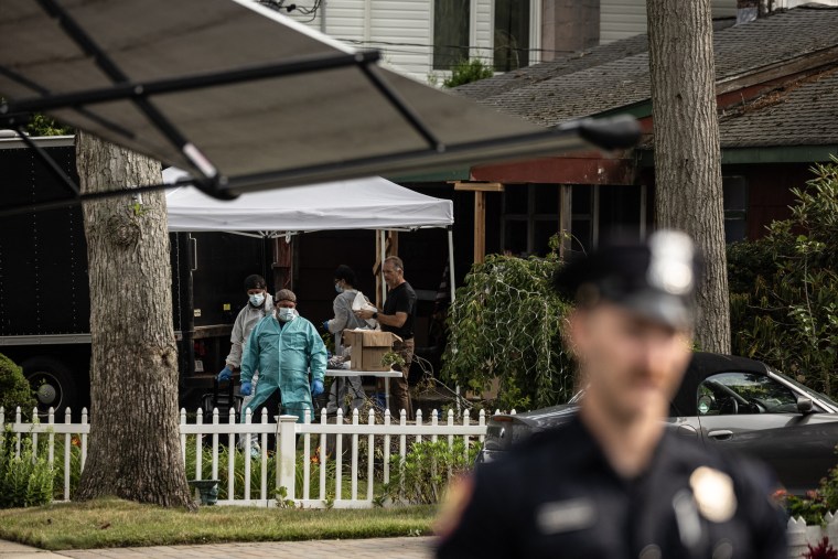 Crime laboratory officers search the home Rex Heuermann in Massapequa Park, New York on July 18, 2023.