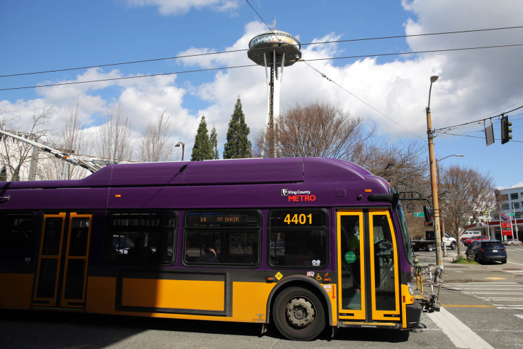 A King County Metro bus drives down 3rd Avenue in Belltown, Monday, April 2, 2018.  (Genna Martin, seattlepi.com)
