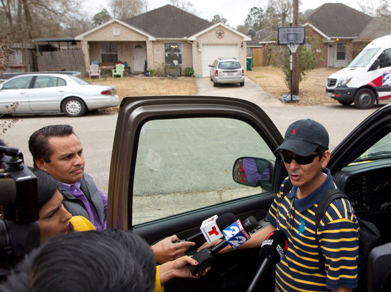 Ulises Valladares' brother Ernesto speaks to members of the media across from his brother's home in 2018.