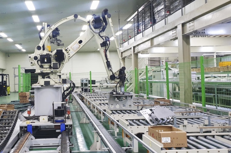An industrial robot crushed a worker to death at a vegetable packaging plant in South Korea, police said Thursday, as they investigate whether the machine was unsafe or had potential defects. 