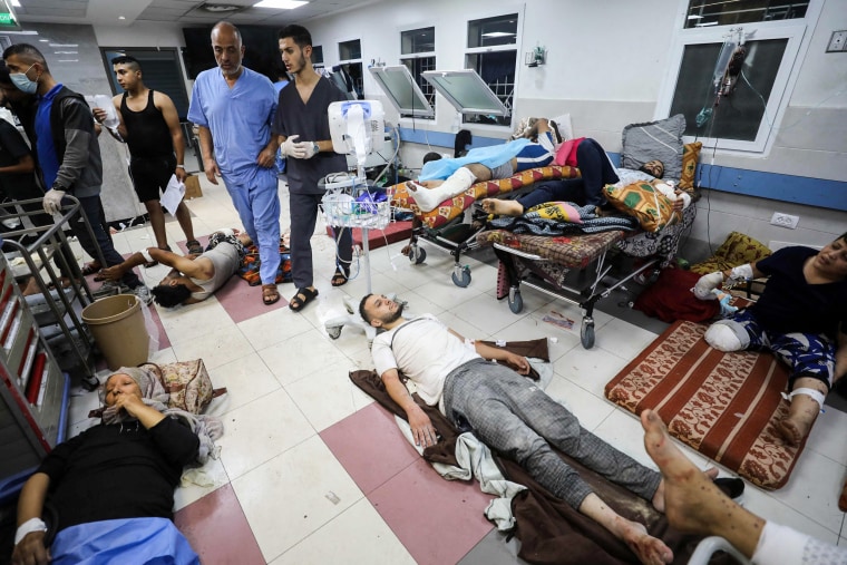 Wounded people receive treatment at Al-Shifa hospital in Gaza City.